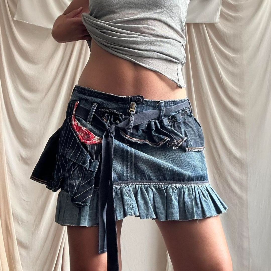 DESCONSTRUCTED DENIM MINI SKIRT by Marithé + François Gibaud by MARITHE AND FRANCOIS GIRBAUD in size FR 42 from SKIRTS category