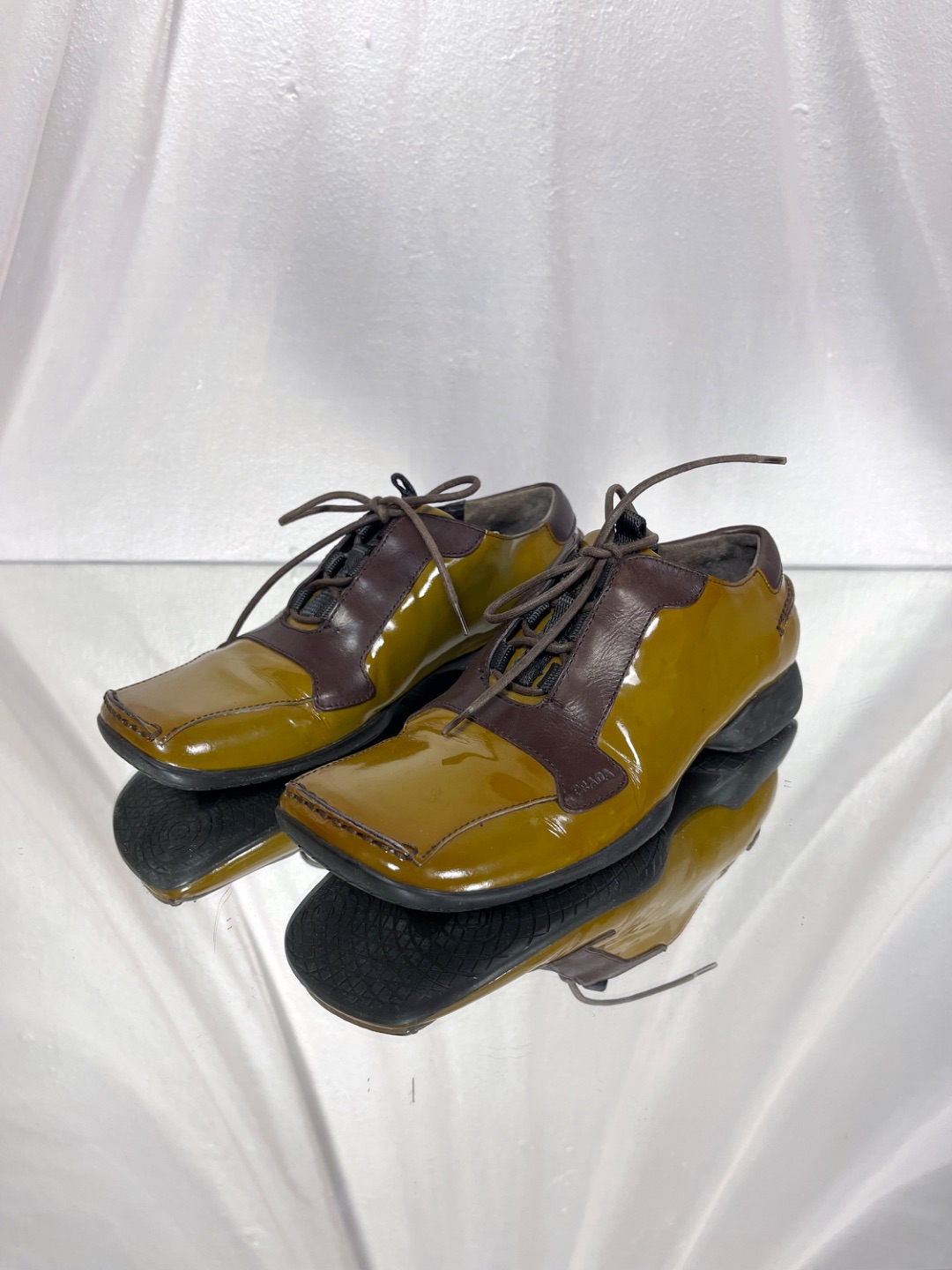 Prada FW 1999 patent leather lace up shoes in dark mustard with contrasting brown panel chunky sole sneakers by PRADA in size EU 37 from SHOES category